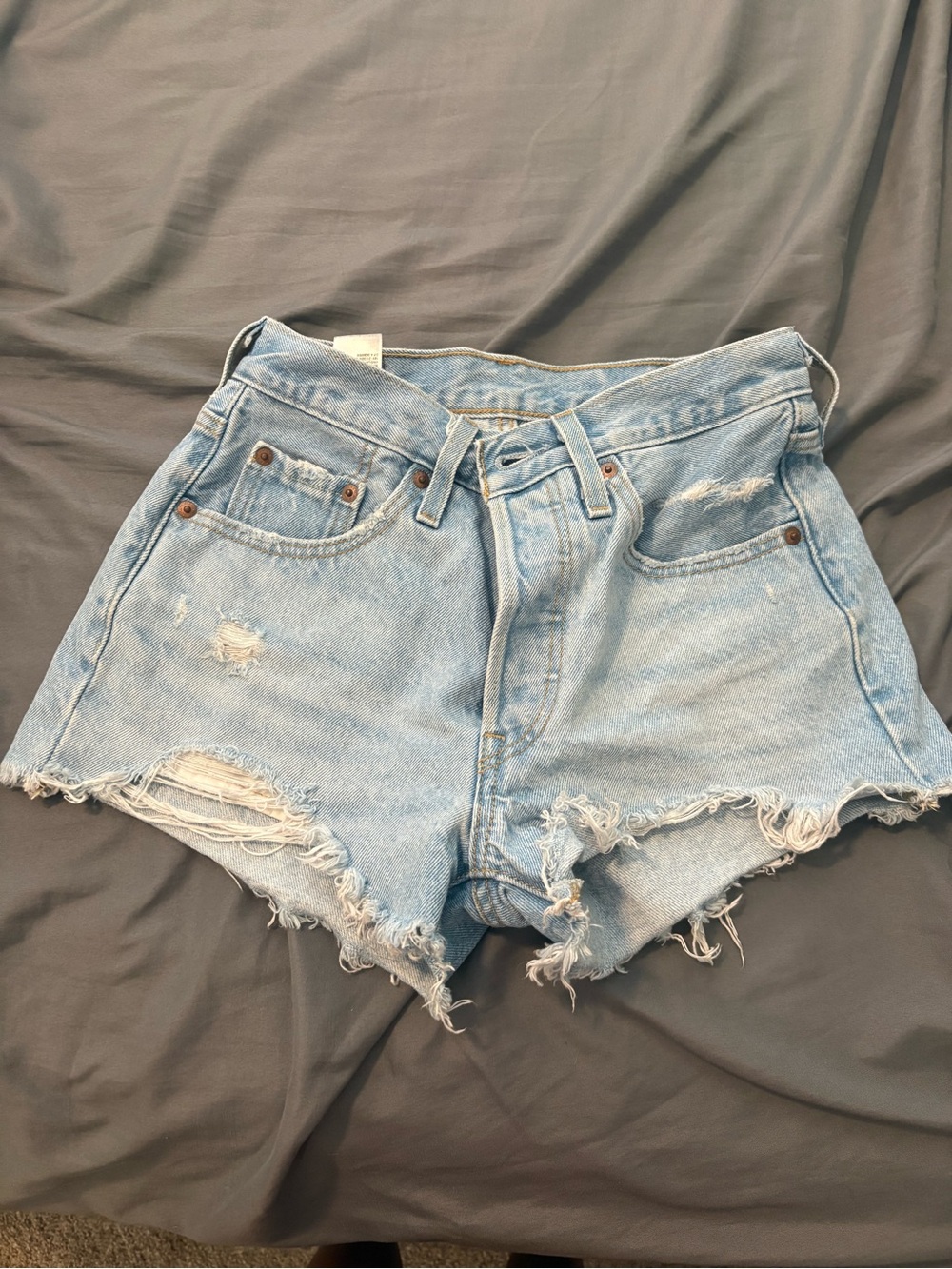 Levi’s 501 Light Wash Distressed Denim Shorts